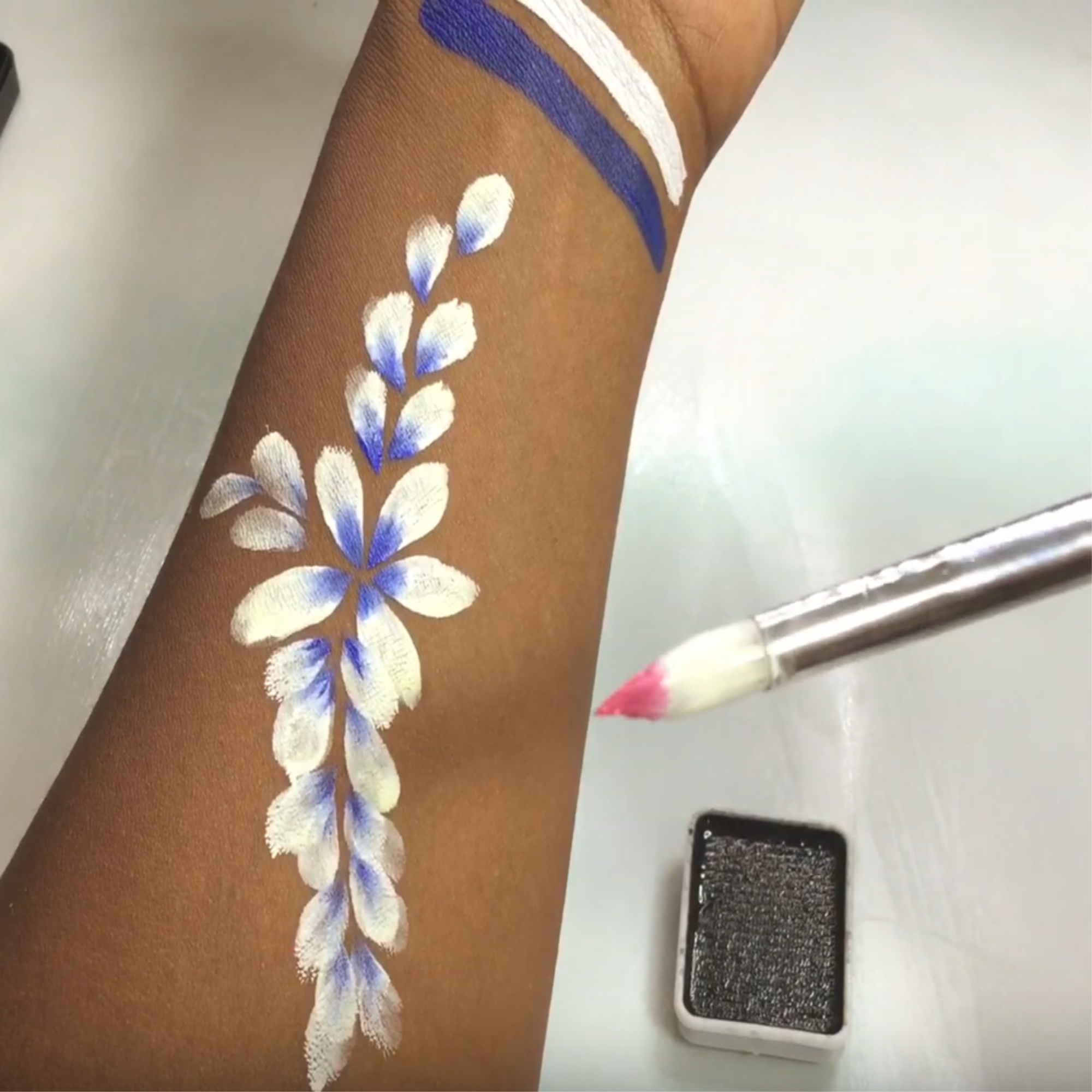 Flower Face Painting Arm